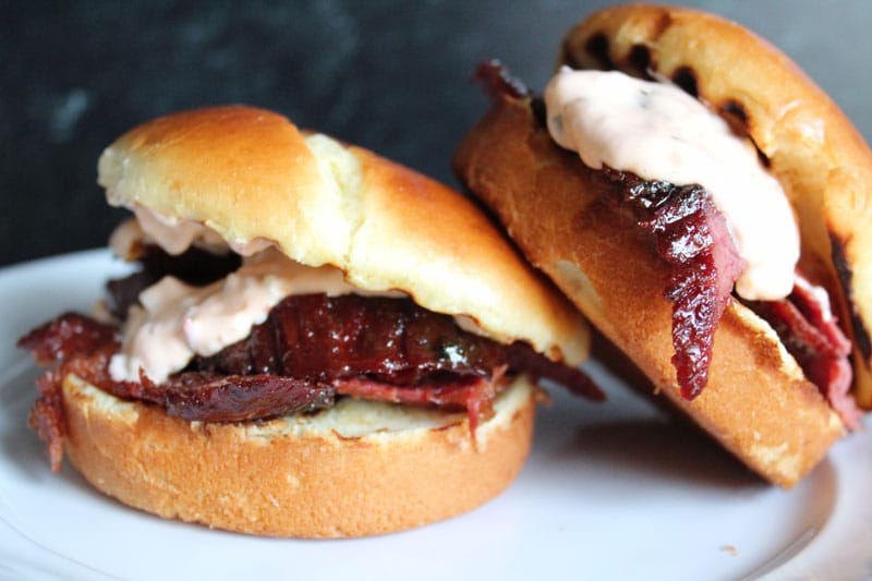 two bourbon molasses corned beef sandwiches with thousand island dressing
