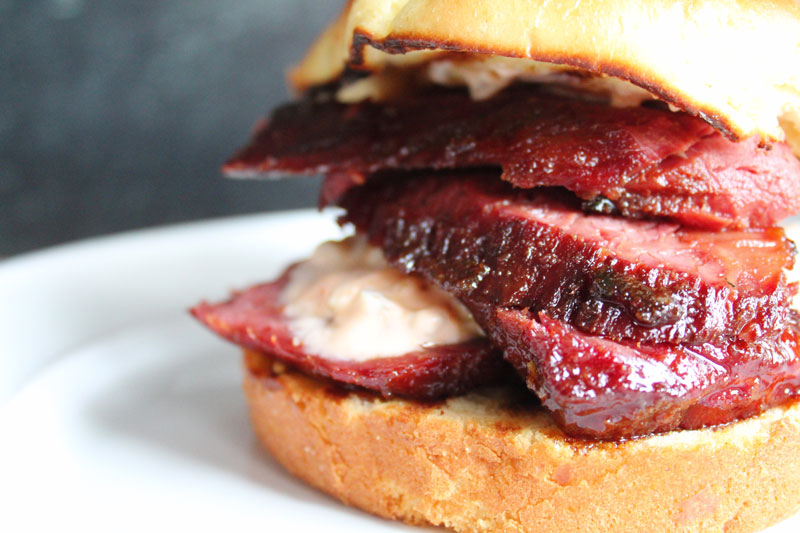 A close up of layers of corned beef
