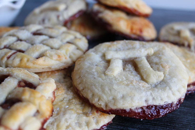 The mathematical symbol of pi on top of a piece of pie