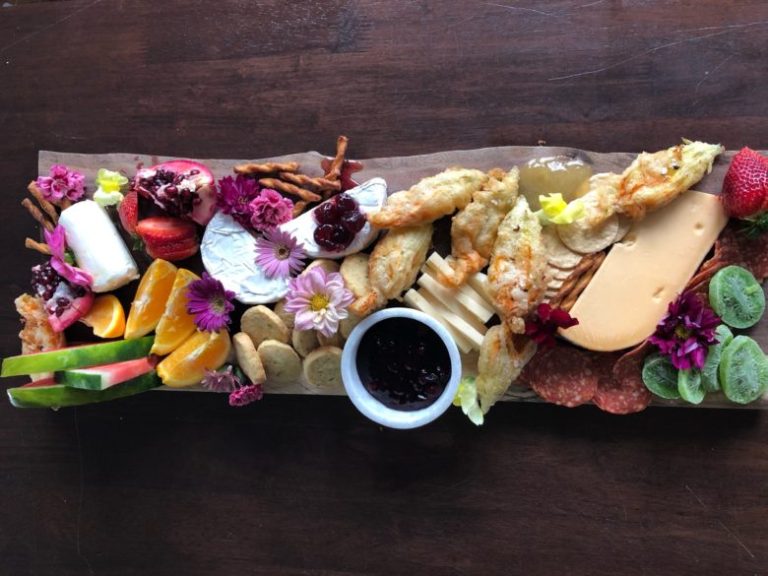 The Ultimate Spring Cheese Board with Stuffed Zucchini Squash Blossoms